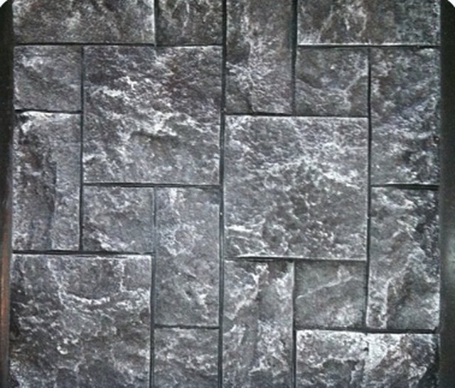 Concrete panel cast in the Rugged Ashlar Slate pattern, showing squared blocks in a random layout.