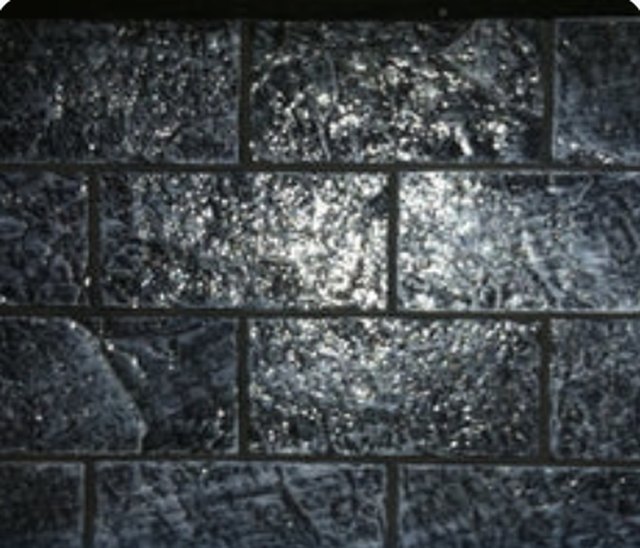 Concrete panel cast in the Best Brick Slate pattern, showing brick coursing with a textured slate face.